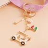 Fashnzfab Golf Cart Club Keychain Bag Charm In Gold