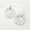 Fashnzfab Hammered Metal Concentric Circle Dangle Earrings - Matte Silver In Brown