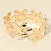 Fashnzfab Hammered Metal Flower Cutout Cuff Bracelet In Gold