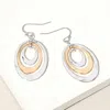 Fashnzfab Hammered Metal Triple Open Oval Layered Dangle Earrings In Gold