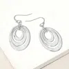 Fashnzfab Hammered Metal Triple Open Oval Layered Dangle Earrings - Rhodium In Silver