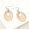 Fashnzfab Hammered Metal Triple Open Oval Layered Dangle Earrings In Gold