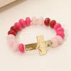 Fashnzfab Hammered Polished Metal Cross Accent Resin Flat Disc Beaded Stretch Bracelet In Pink