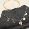 Fashnzfab Heart Butterfly Charm Station Bag Charm In Multi