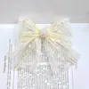 Fashnzfab Holographic Ball Pointed Lace Bow Barrette In White