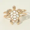 Fashnzfab Intricate Mother Of Pearl Shell Design Turtle Hinged Bracelet In Gold