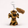 Fashnzfab Leopard Patterned Genuine Fur Calf Cross Tassel Keychain / Bag Charm In Brown