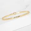 Fashnzfab Let It Go Message Brass Thin Hook Bracelet Gold In Gold