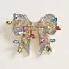 Fashnzfab Light Accent Christmas Bow Pin Brooch In Silver