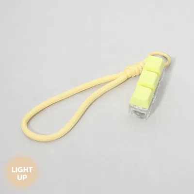Fashnzfab Light Up Led Stress Relief Cube Keyboard Bag Charm In Yellow