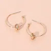 Fashnzfab Love Knot Metal Wire Hoop Earrings In Gold