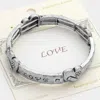 Fashnzfab Love Message Stretch Bracelet Silver Burnished In Multi