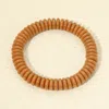Fashnzfab Marbled Flat Disc Beaded Stretch Bracelet In Brown