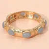 Fashnzfab Marbled Oval Stone Accent Hammered Metal Beaded Stretch Bracelet In Gold