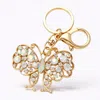 Fashnzfab Marquise Round Crystal Butterfly Keychain / Bag Charm In Gold
