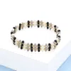 Fashnzfab Metal Ball Faceted Beaded Stretch Bracelet Black, White In Multi