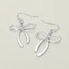 Fashnzfab Metal Bow Dangle Earrings In Silver