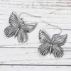 Fashnzfab Metal Butterfly Dangle Earrings In Multi
