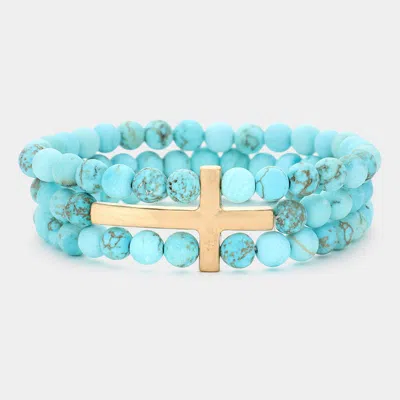 Fashnzfab Metal Cross Accented Triple Layered Semi Precious Stretch Bracelet Turquoise, Worn Gold In Blue
