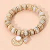 Fashnzfab Metal Embossed Medal Square Stone Pearl Charm Rein Disc Beaded Stretch Bracelet In Gold
