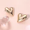 Fashnzfab Metal Heart Earrings - Gold In Gold