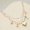 Fashnzfab Metal Heart Locket Western Boot Cross Pearl Chain Layered Necklace In Gold
