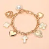 Fashnzfab Metal Heart Pearl Clover Cross Charm Station Bracelet Gold In Gold