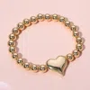 Fashnzfab Metal Heart Pointed Ball Stretch Bracelet In Gold