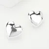 Fashnzfab Metal Heart Stud Earrings In Metallic