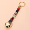 Fashnzfab Metal Heart Tip Pointed Colorful Resin Round Beaded Bag Charm / Keychain In Gold