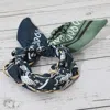 Fashnzfab Metal Interlocking Ring Fabric Bandana Scarf Adjustable Bracelet In Brown