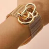 Fashnzfab Metal Knot Accent Mesh Magnetic Bracelet In Gold