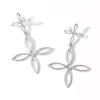 Fashnzfab Metal Open Flower Dangle Earrings In Silver