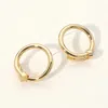 Fashnzfab Metal Round Nail Earrings In Gold