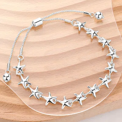 Fashnzfab Metal Starfish Link Adjustable Pull Tie Bracelet - Silver In Metallic