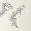 Fashnzfab Metal T-rex Dinosaur Keychain / Bag Charm In Multi