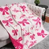 Fashnzfab Mixed Pink Ribbons / Bow Patterned Reversible Throw Blanket In Pink