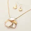Fashnzfab Mother Of Pearl Accent Geometric Pendant Necklace In Gold