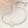 Fashnzfab Mother Of Pearl Quatrefoil Pointed Brass Metal Round Cz Stone Adjustable Pull Tie Bracelet Mother Of In Metallic