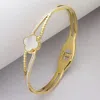 Fashnzfab Mother Of Pearl Quatrefoil Pointed Stone Paved Stainless Steel Hinged Bangle Bracelet Gold In Gold