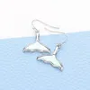 Fashnzfab Mother Of Pearl Whale Tail Dangle Earrings - Mother Of Pearl In Silver