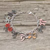 Fashnzfab Multi Bow Charm Station Bracelet In Multi