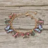 Fashnzfab Multi Butterfly Charm Station Bracelet In Gold