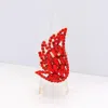 Fashnzfab Multi Stone Embellished Angel Wing Stretch Ring In Red