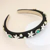 Fashnzfab Multi Stone Embellished Flower Headband In Black