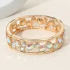 Fashnzfab Multicolor Various Shaped Stone Bezel Embellished Open Frame Stretch Bracelet Ab, Gold In Gold
