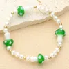 Fashnzfab Mushroom Accented Pearl Stretch Bracelet Olive Green, Worn Gold In Multi