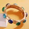 Fashnzfab Natural Round Stone Pointed Brushed Metal Stretch Bracelet In Gold