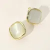 Fashnzfab Natural Stone Metal Trim Clip On Earrings In Gold