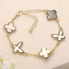 Fashnzfab Natural Stone Quatrefoil Butterfly Link Bracelet Gray In Gray